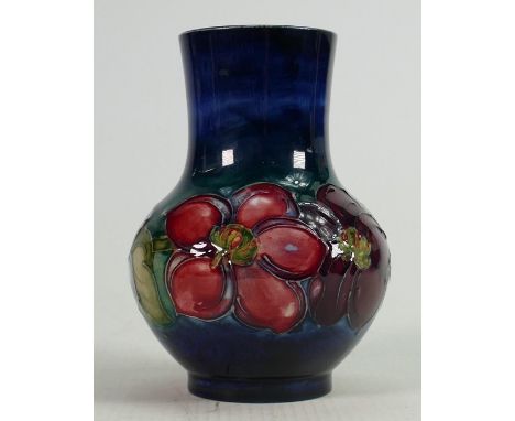 Moorcroft Anemone on fading blue ground vase: Height  12cm. 