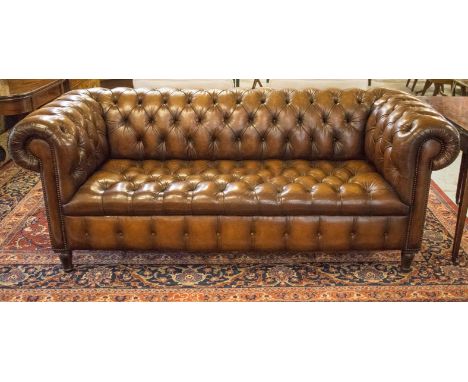 CHESTERFIELD SOFA, Victorian style deep button and brass studded hand finished leaf brown leather with curved back and arms, 