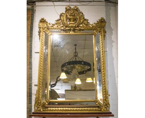 WALL MIRROR, late 19th/early 20th century French giltwood with cushion marginal bevelled plates, central bevelled plate and c