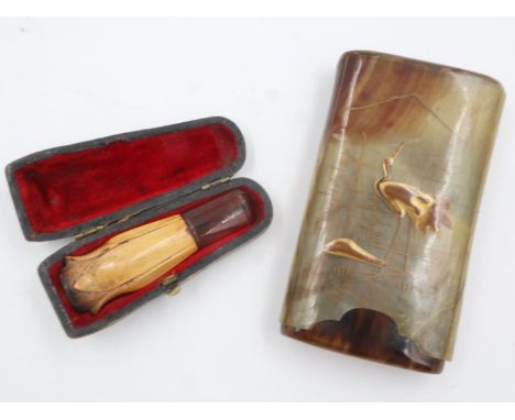 Oriental carved horn cigar case, together with a cased cigarette holder (2). UK P&amp;P Group 1 (£16+VAT for the first lot an