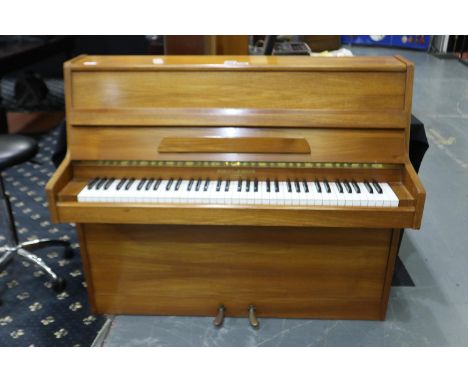 Kastner-Welhau short overstrung piano in light oak. Not available for in-house P&amp;P 
