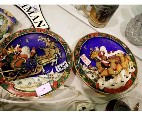 Two electric musical Santa plaques. All electrical items in this lot have been PAT tested for safety and have passed. This do