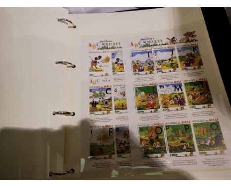 The Disney World of Postage Stamps album. UK P&amp;P Group 1 (£16+VAT for the first lot and £2+VAT for subsequent lots) 