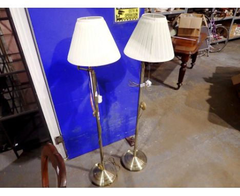 Pair of brass standard lamps with shades, H: 140 cm. All electrical items in this lot have been PAT tested for safety and hav