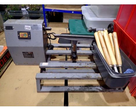 Sip variable wood lathe with extension rail, tool rest and 11 wood carving tools, working at lotting. Not available for in-ho