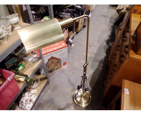 Brushed metal standard lamp. All electrical items in this lot have been PAT tested for safety and have passed. This does not 