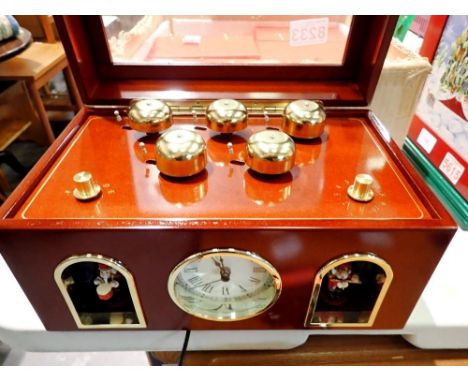 Mr Christmas musical box with clock. All electrical items in this lot have been PAT tested for safety and have passed. This d