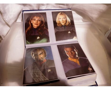 Album of approximately 110 Star Trek post cards. UK P&amp;P Group 1 (£16+VAT for the first lot and £2+VAT for subsequent lots