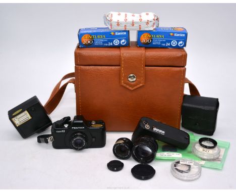 Asahi Optical Company - A Pentax Auto 110 SLR Cartridge film Camera outfit including Auto 110 SLR Camera Body, 18mm f/2.8 len