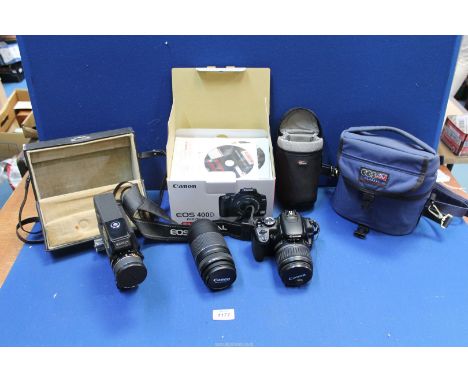 An EOS 400 D Canon digital Camera with extra lens Canon 75-300 f-4-5.6 lens (with box and paperwork) and a Sankyo cine camera