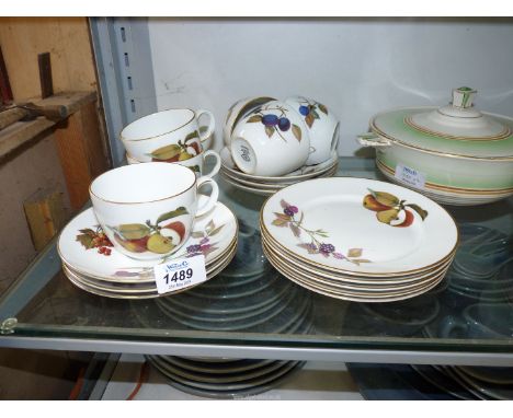 A Royal Worcester Evesham part Teaset to include six cups and saucers and five tea plates.