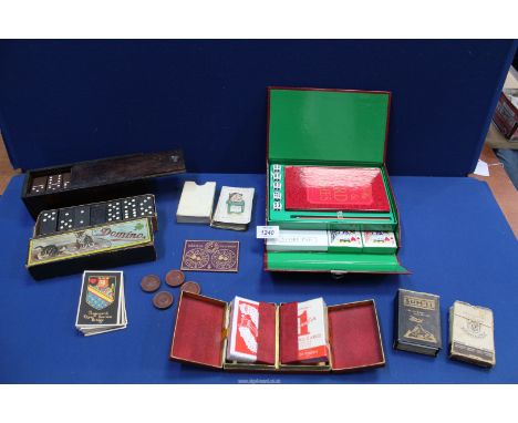 A small quantity of games including dominoes, playing cards, Sum-it cards etc