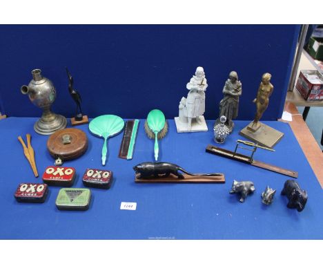 A quantity of miscellanea including metal and porcelain Joan of Arc figures, enamel backed dressing table set, part of a hook