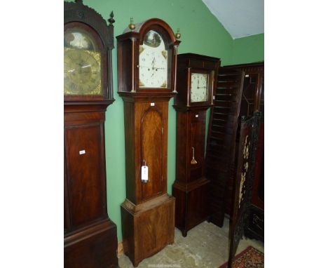 A boxwood strung Mahogany cased Longcase Clock having an arched dial with Arabic numerals, inset second hand and date registe