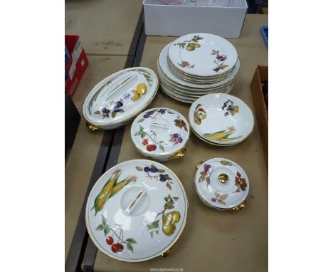 A Royal Worcester Evesham part dinner service comprising dinner plates, soup/cereal bowls, lidded serving dishes, etc.