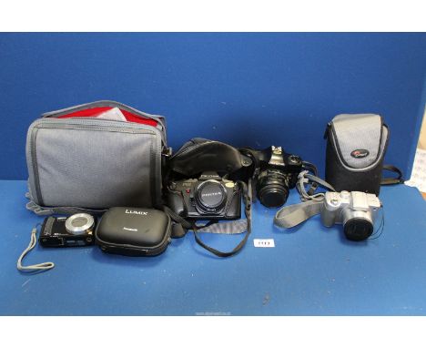 Four cameras including Pentax P50, Panasonic Lumix, Olympus OM101 Power Focus etc., plus soft cases.