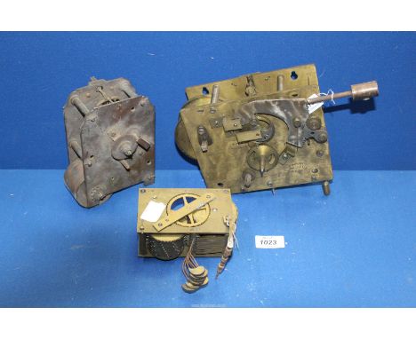 Three clock movements including large single Fusee movement, English wall clock Fusee movement and a Brass movement for attac