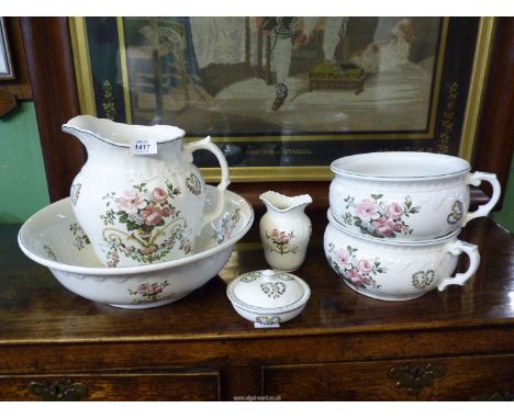 A Bristol ware 'Pountney & Co' bathroom set to include; a jug and basin, two chamber pots, soap dish and water vase.