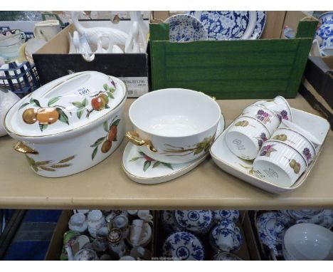 A quantity of Royal Worcester Evesham dinner ware including large casserole dish, ramekins etc.