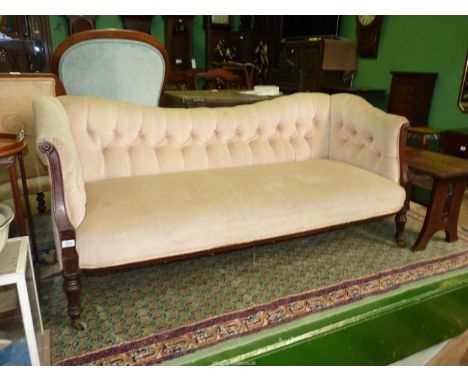 A Mahogany show farmed buttoned back double ended Sofa, nicely upholstered in a peach/beige shade Dralon type fabric and stan
