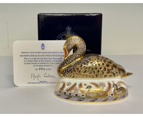 A Royal Crown Derby paperweight, Golden Jubilee Black Swan, specially commissioned by Royal Doulton in 2002 to celebrate the 