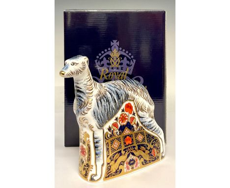 A Royal Crown Derby paperweight, Lurcher, the base decorated in the 1128 Imari pattern with leaping hares in gold, gold stopp