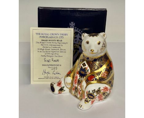 A Royal Crown Derby paperweight, Imari Honey Bear, decorated in the 1128 pattern, commissioned by Goviers of Sidmouth, design