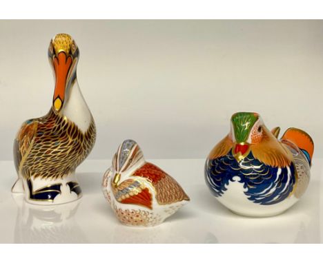A Royal Crown Derby paperweight, Brown Pelican, silver stopper, 13cm high, printed mark; others, Mandarin Duck, silver stoppe