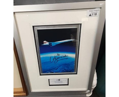 Framed and signed photograph, 'Concorde from Concorde', together with a miniature solid cast hiduminium alloy from Concorde m