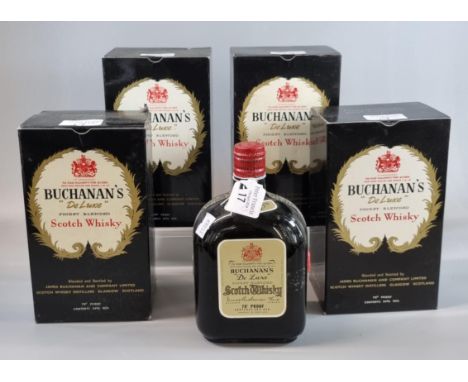 Five bottles of Buchanan's 'De Luxe' Finest Blended Scotch Whisky. 70% proof 26 2/3 ozs. Four with original boxes. (5) (B.P. 