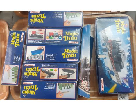 Fleischmann Magic Train items to include: locomotive, coaches and tankers etc.  (7)  (B.P. 21% + VAT) 