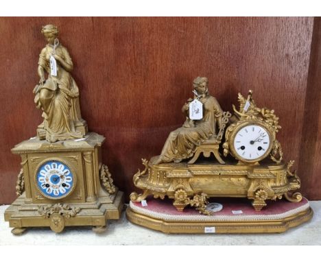 Two 19th century gilt spelter figural mantel clocks, both with ceramic Roman faces, one on additional base.  (2)  (B.P. 21% +