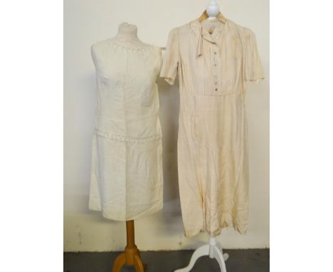 Two vintage dresses; one Austrian silk (probably 1940's) with pleated skirt by Wien and a cream crepe 1960's beaded shift dre