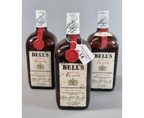 Three bottles of Bell's Royal VAT De Luxe Liqueur Blended Scotch Whisky. 70% proof. (B.P. 21% + VAT)  Images of the back of c