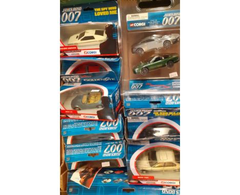 Two trays comprising various Corgi James Bond diecast model vehicles, all appearing in original boxes.  (B.P. 21% + VAT) 