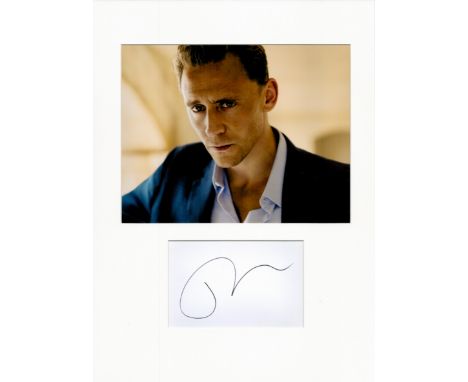 Tom Hiddleston 16x12 overall The Night Manager mounted signature piece includes signed album page and a colour photo. Thomas 