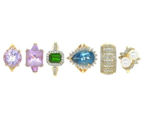 SIX GEM SET 9CT GOLD RINGS COMPRISING A DIAMOND RING, A TOPAZ AND DIAMOND RING, A PERIDOT AND DIAMOND RING, TWO AMETHYST RING