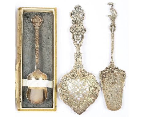 A VICTORIAN SILVER SUGAR SIFTER, BY LEVI &amp; SALAMAN, LONDON 1891, AN ORNATE DUTCH SILVER SERVING SPOON, SPURIOUS 18TH C MA