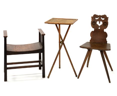 A SCANDINAVIAN CARVED OAK CHAIR DATED 1761 (SEAT SPLIT), AN OAK STOOL AND A BAMBOO TRIPOD TABLE