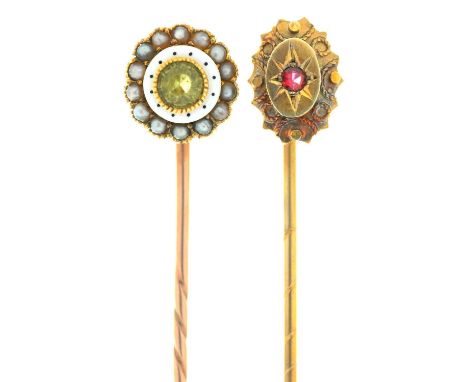 TWO GEM SET GOLD STICK PINS, ONE WITH WHITE ENAMEL TERMINAL SET WITH PERIDOT AND SPLIT PEARLS, THE OTHER WITH GARNET 