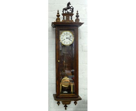 A GERMAN STAINED OAK WALL CLOCK WITH BRASS AND ENAMEL DIAL, 125CM H 