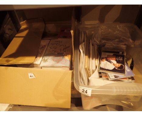 Selection of books and CDs including Queen set, Michael Jackson etc 