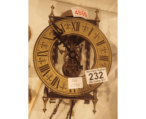 Wall mounted skeleton clock, Tempus Fugit with top bell, chain drive, weight and pendulum