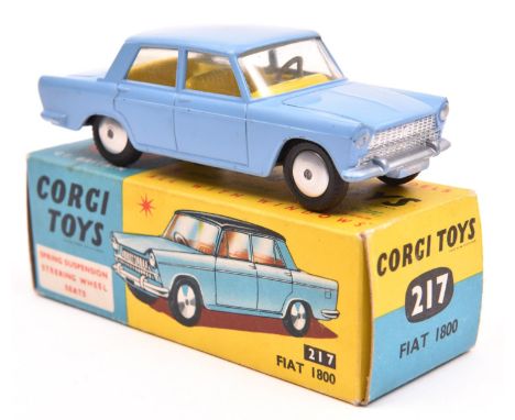 Corgi Toys Fiat 1800 (217). An example in lilac with yellow interior, smooth spun wheels and black tyres. Boxed, minor wear. 