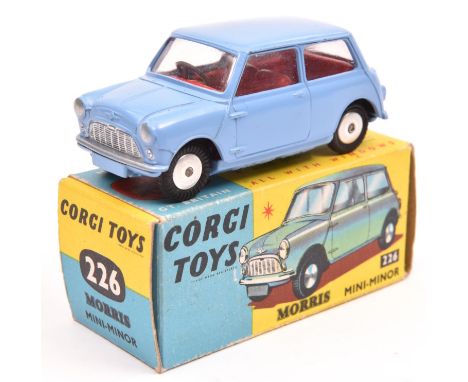 Corgi Toys Morris Mini Minor (226). In lilac with red interior, smooth spun wheels with black tyres. Boxed. Vehicle Mint £60-