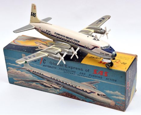 An impressive T.N. of Japan tinplate battery powered 1950's DC-7C 4 engined airliner. An example finished in 'Scandinavian Ai