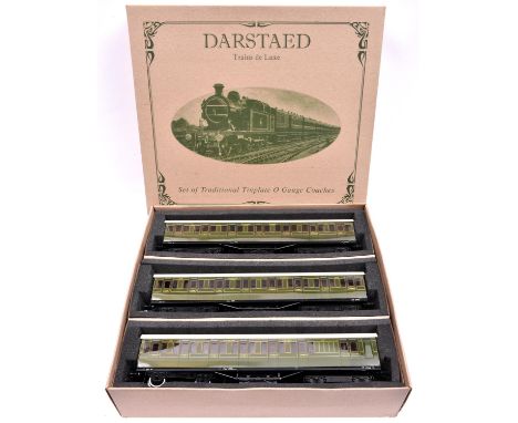 A Darstaed Trains O gauge Southern Railway 3 coach set with internal lighting on third rail pick-up, in lined green livery. S
