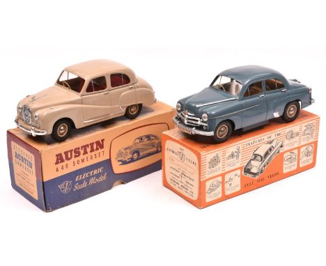 2 Victory Industries 'Point of Sale' battery powered cars. An Austin A40 Somerset in cream with red interior, 'AUS 40' regist