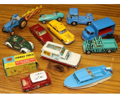 A quantity of Corgi Toys. BMC Mini-Cooper 'S'. Boxed, some wear/damage. Karrier Bantam 2-ton. Citroen Safari. Chevrolet Impal