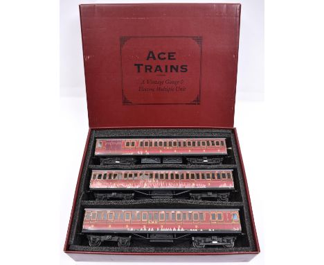 An Ace Trains O gauge LMS 3 unit EMU set in lined maroon livery for 3 rail running. Set comprising 3x compartment coaches; a 